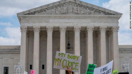 Abortion-rights protesters regroup and protest following Supreme Court&#39;s decision to overturn Roe v. Wade.