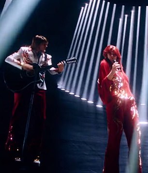 Throwback: The pop pioneers resembled their much younger shelves and are dressed in 1970s silver sequinned ensembles