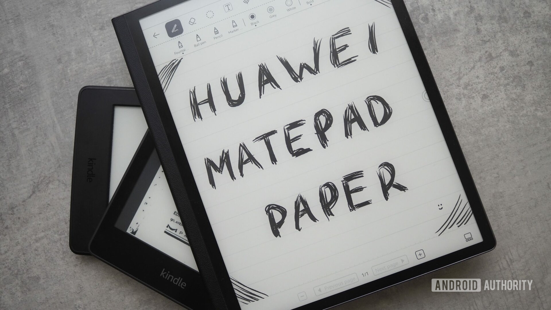 huawei matepad paper on top of kindles