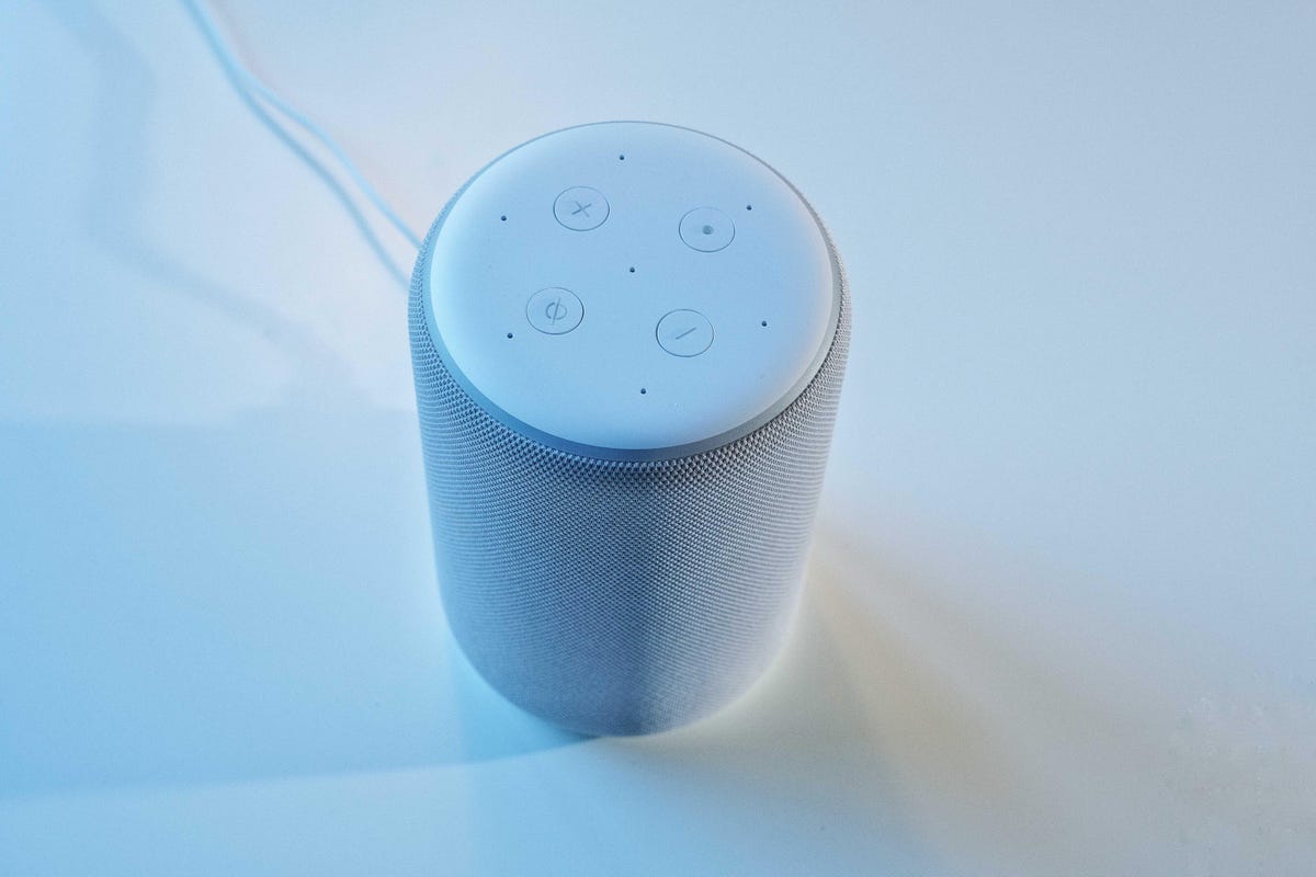 A white second gen Amazon Echo smart speaker from an aerial view