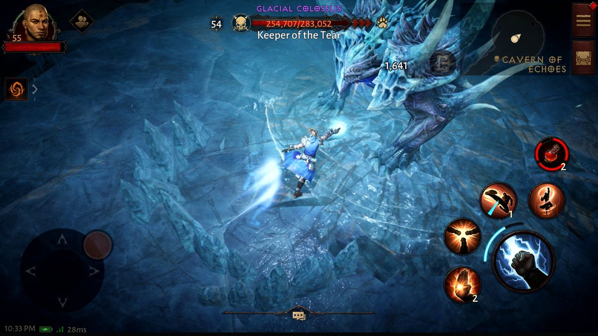 A Monk battles the Keeper of the Tear boss in an icy dungeon in a screenshot from Diablo Immortal