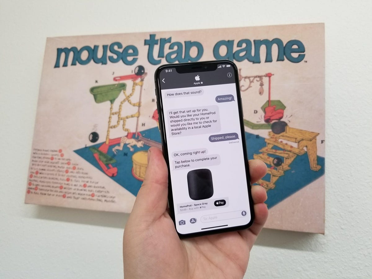 Chat screen with old Mouse Trap board game in the background