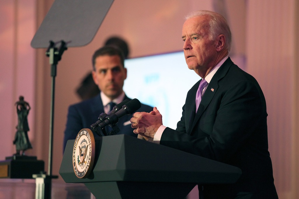 WASHINGTON, DC - APRIL 12: Hunter Biden (L) and U.S. Vice President Joe Biden speak on stage at the World Food Program USA's Annual McGovern-Dole Leadership Award Ceremony at Organization of American States on April 12, 2016 in Washington, DC. 