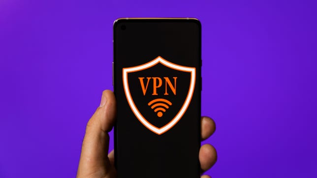 phone with letters VPN and Wi Fi logo on screen