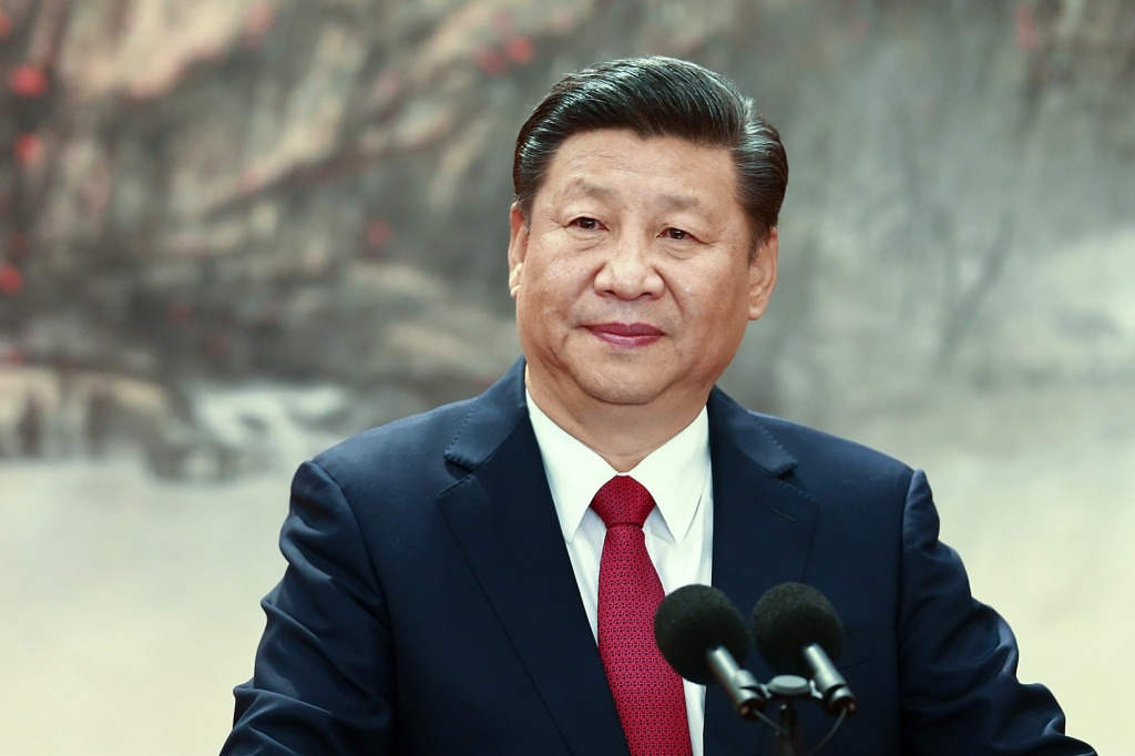 BEIJING, CHINA - OCTOBER 25:  Chinese President Xi Jinping speaks at the podium during the unveiling of the Communist Party's new Politburo Standing Committee at the Great Hall of the People on October 25, 2017 in Beijing, China. China's ruling Communist Party today revealed the new Politburo Standing Committee after its 19th congress.  